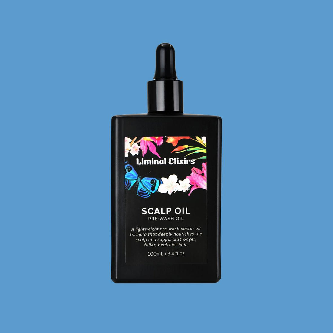 Black bottle of scalp oil with colourful Liminal Elixirs label on a blue background