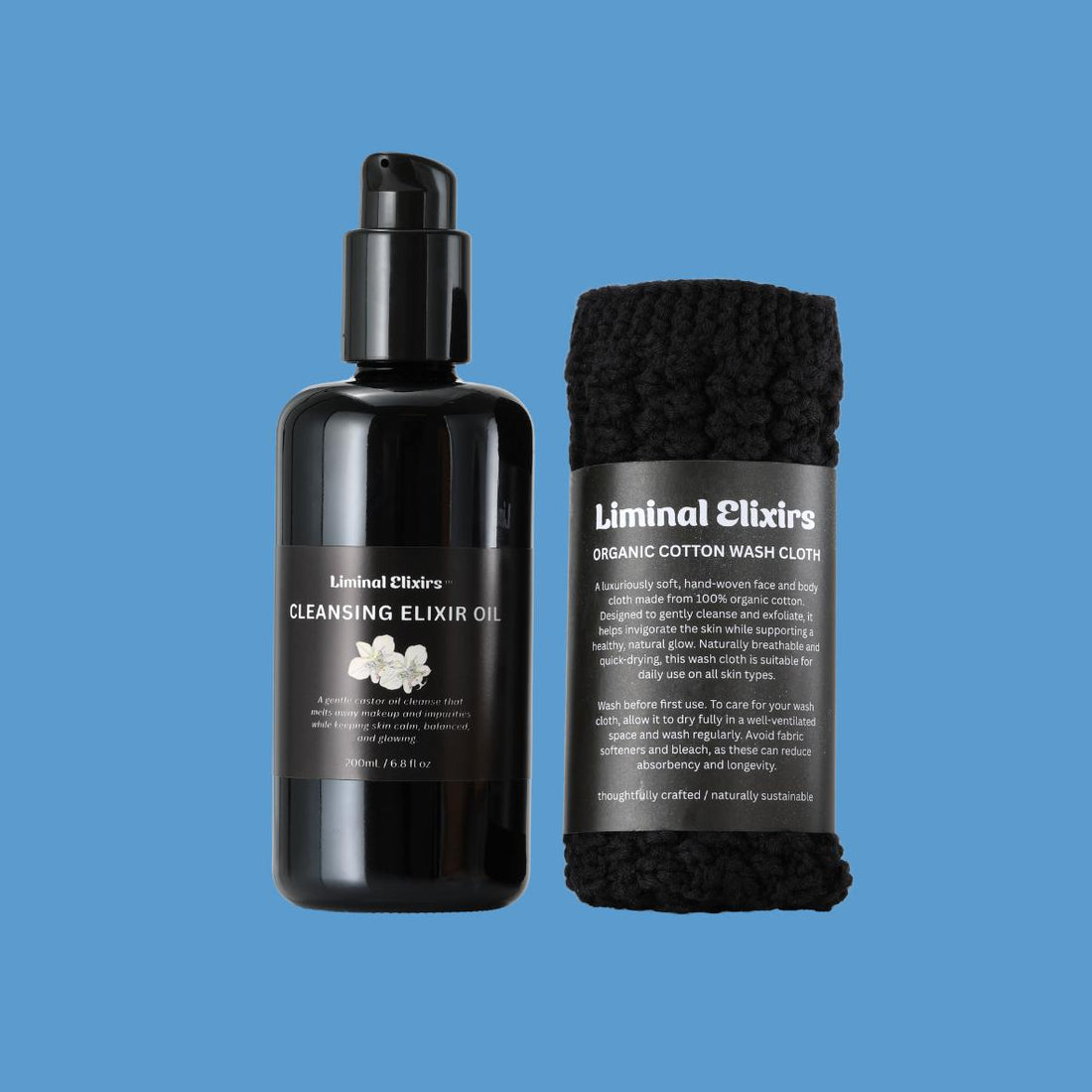 Cleansing oil bottle and organic cotton wash cloth with labels on a blue background, for cleansing bundle product.
