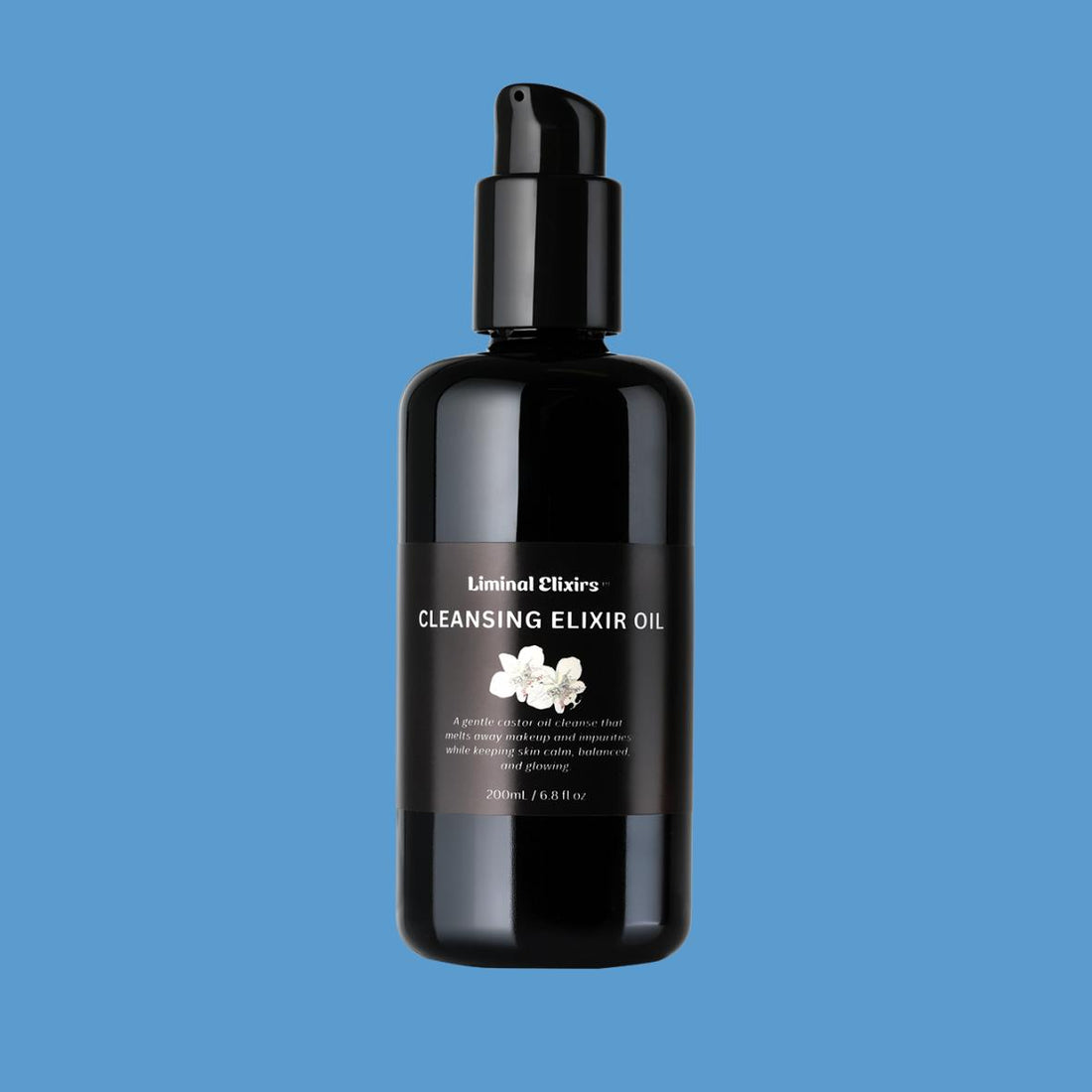 Black bottle of Liminal Elixirs Cleansing Elixir Oil on a blue background