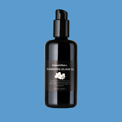 Black bottle of Liminal Elixirs Cleansing Elixir Oil on a blue background