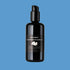 Black bottle of Liminal Elixirs Cleansing Elixir Oil on a blue background