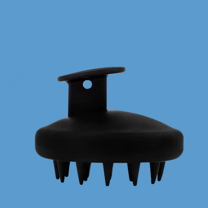 Front on view of silicone scalp massager on blue background