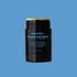 Balm stick of Tallow Balm by Liminal Elixirs on a blue background