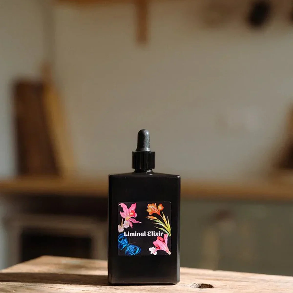 Bottle of Body Oil on wooden table