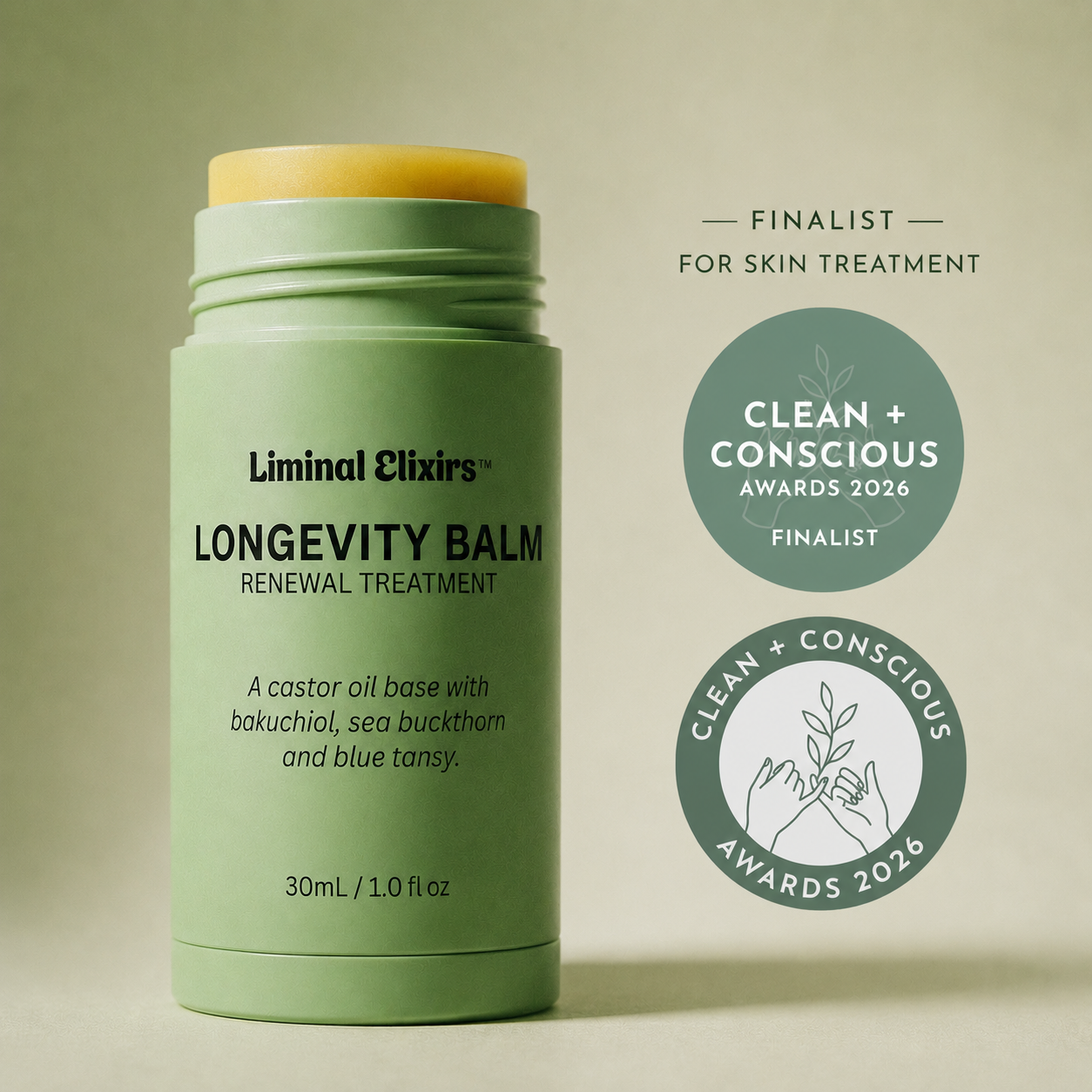 Green longevity balm on a beige background, featuring Clean + Conscious Award logos.