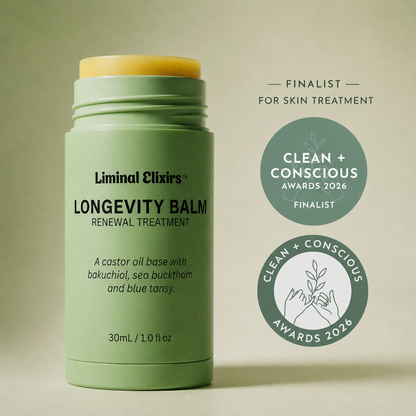 Green longevity balm on a beige background, featuring Clean + Conscious Award logos.
