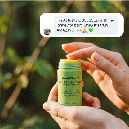 Person holding Liminal Longevity Balm with message text expressing love for the product against a blurred natural background